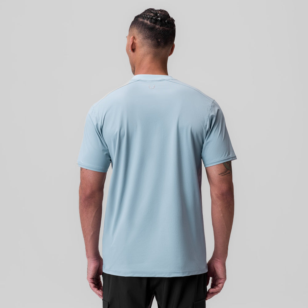 1087. Tetra-Lite® Ice Zip Tee - Light Sky