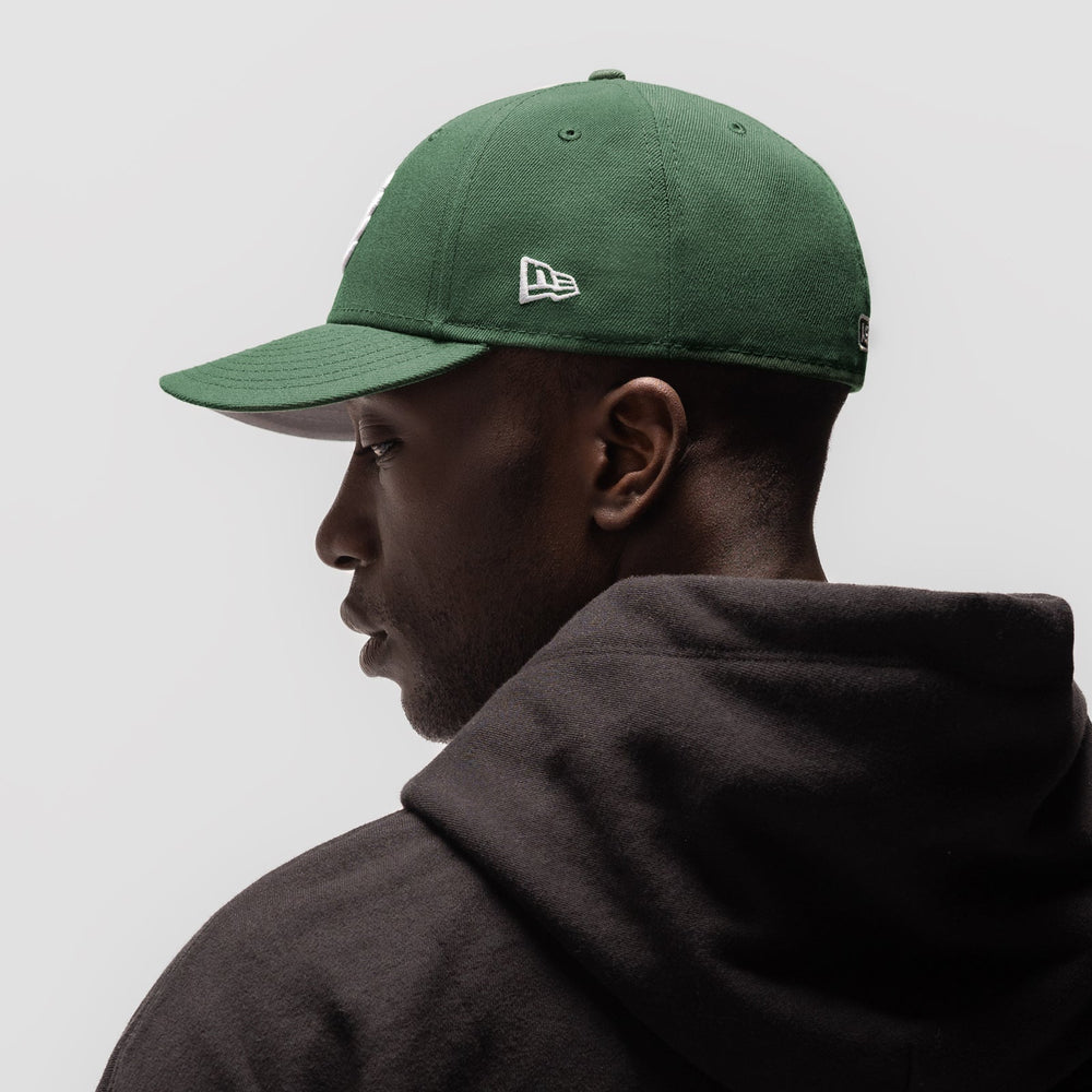 New Era® 59Fifty® Low Profile Hat - Forest Green/White "Wings"