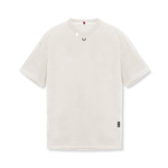 0797. Tech Essential™ Relaxed Tee - Stone/Black "OTWR"