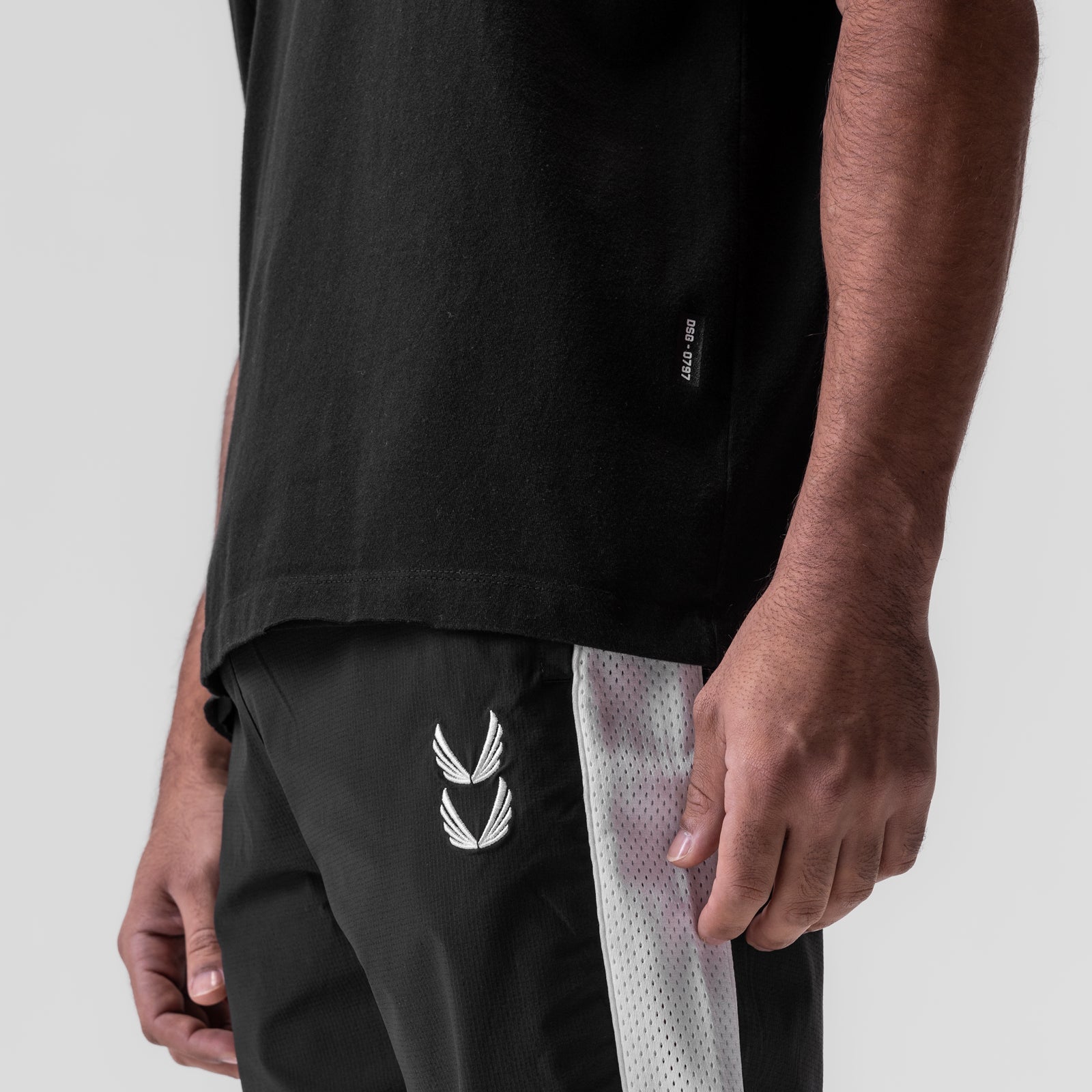 0797. Tech Essential™ Relaxed Tee - Black "Space Bracket"