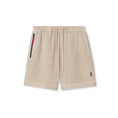 0782. Tech Essential™ Sweat Short - Faded Beige