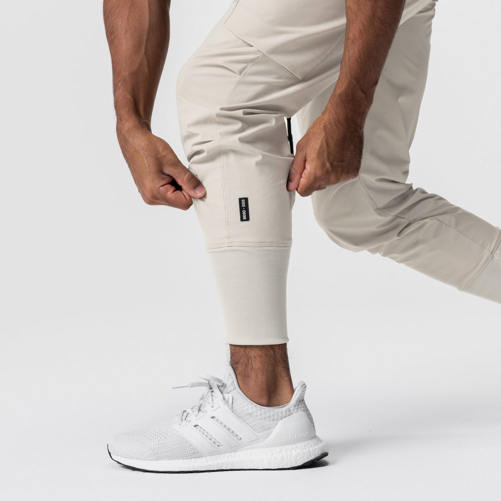 0698. Tetra-Lite® Inlay Pocket High Rib Jogger - Sand Smoke