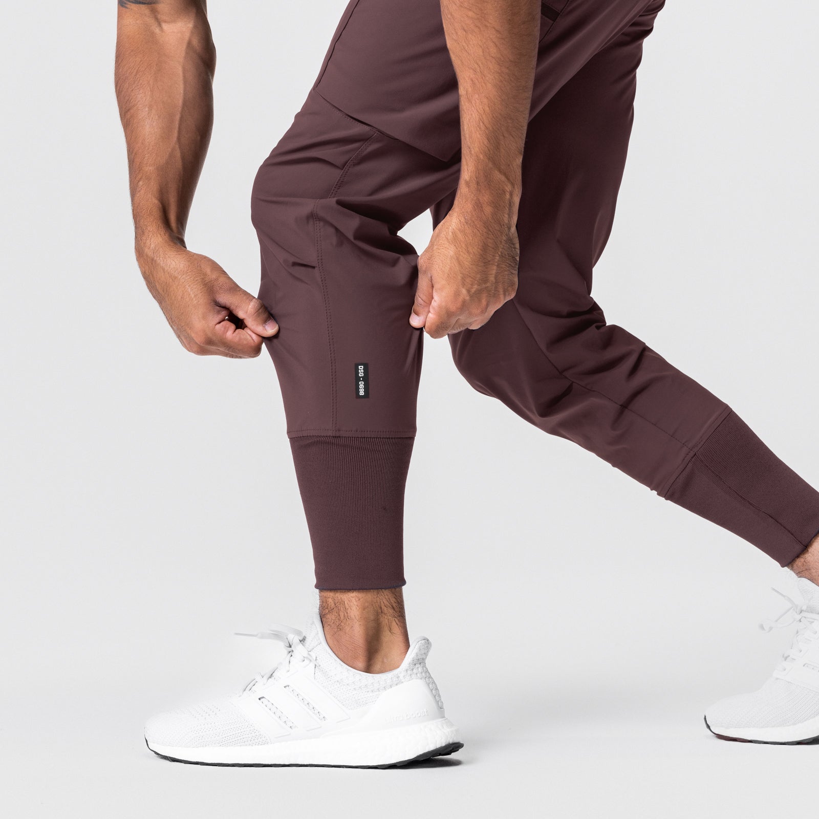 0698. Tetra-Lite® Inlay Pocket High Rib Jogger - Plum